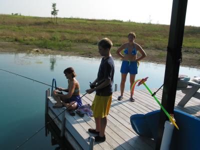 Trina and Jeremy fishing at the boat dock