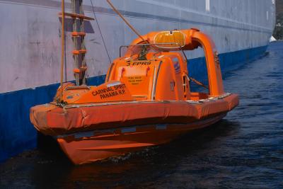 lifeboat stands by during tendering