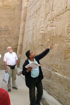 The guide explaining the hieroglyphs