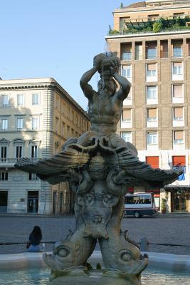 Fontana del Tritone in Piazza Barberini in Rome Italy at the base of Via Veneto.
