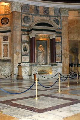 The inside of the Pantheon and the tomb of Renaissance painter, Raphael.