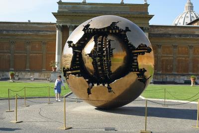 The Courtyard of the Pigna and the famous orb (Modern Art). Vatican, Rome, Italy.