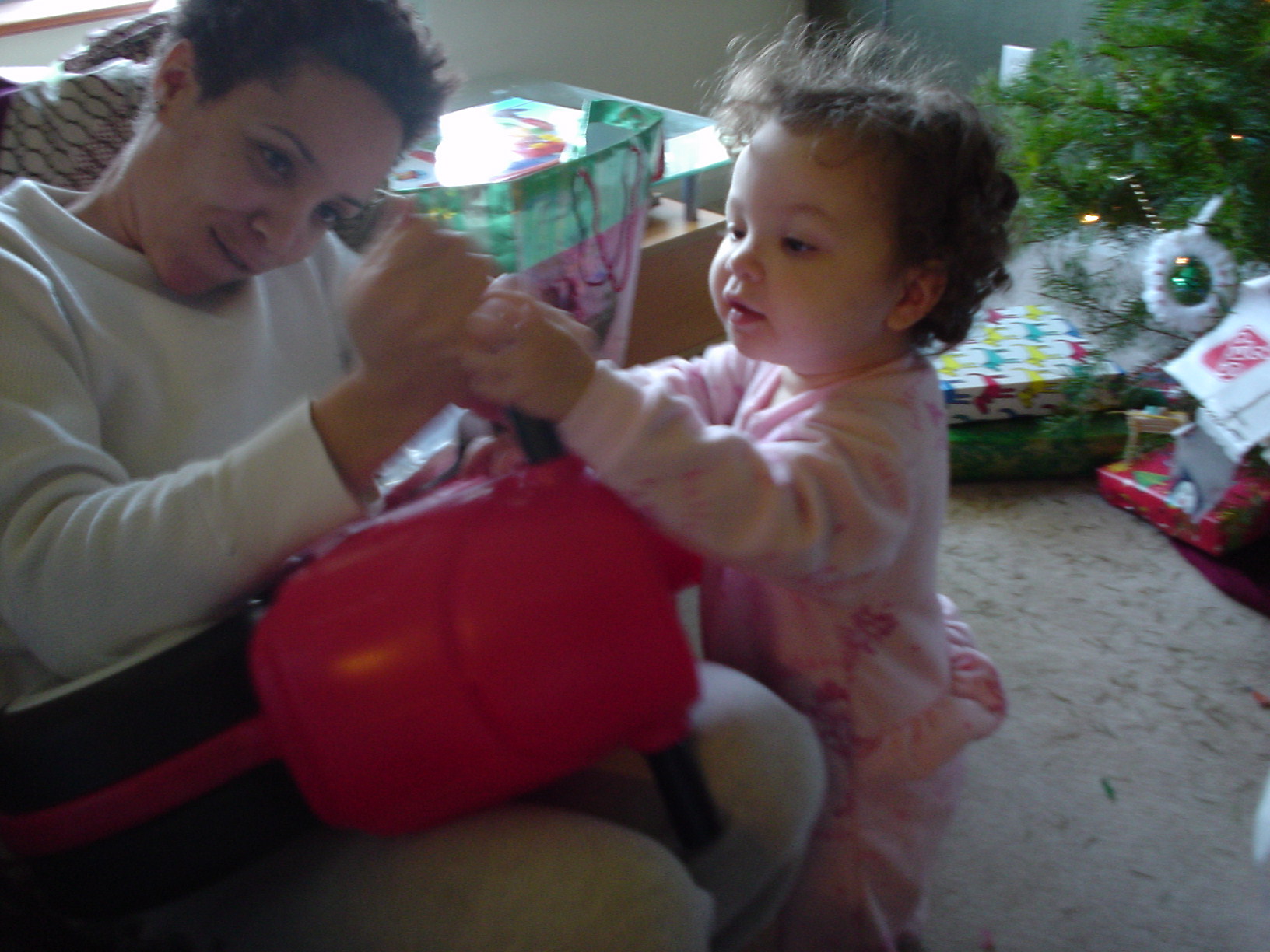 Mom putting Leilas motorcycle together