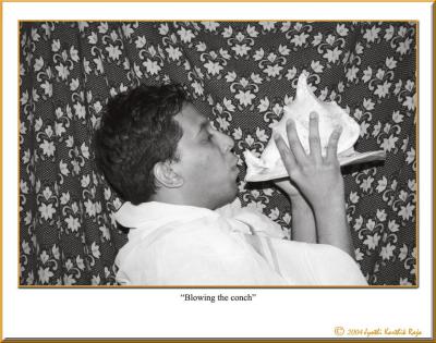 12.31.04 - Blowing the conch
