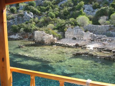 Under the green water, a portion of a sunken city of Kekova