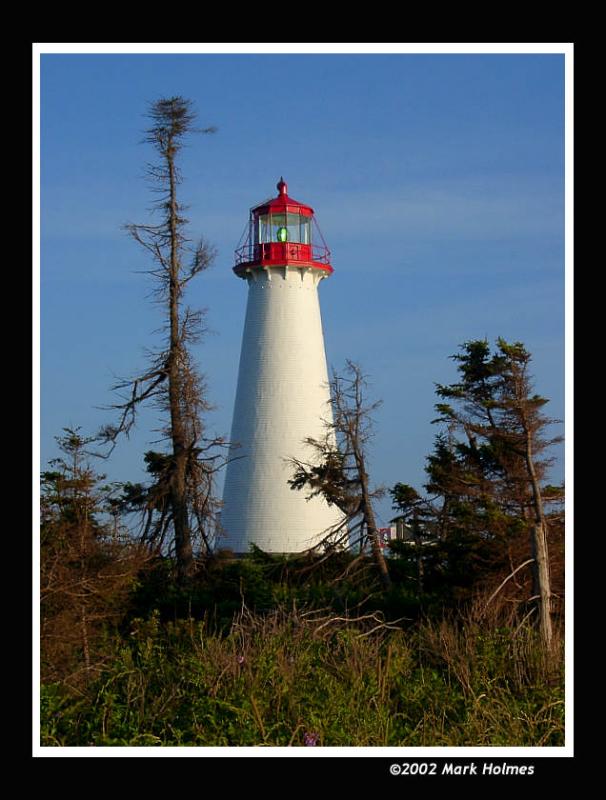 Afternoon sun striking Point Prim lighthouse on PEI