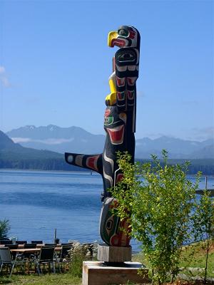 totem at Alert Bay with view of harbor