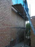 brick wall on west side