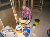 noel helps paint outside