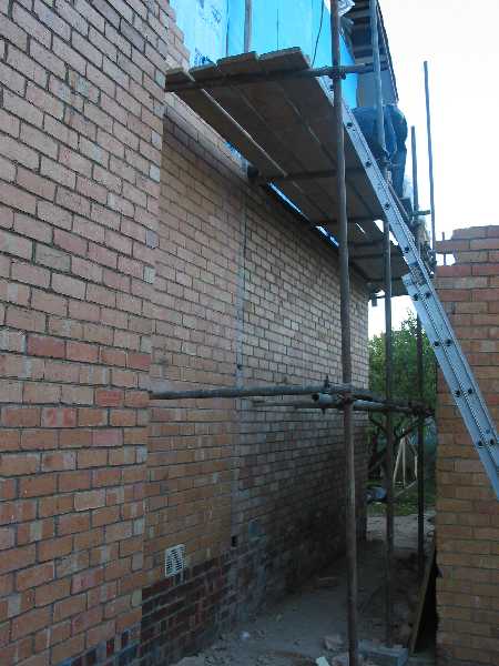 brick wall on west side