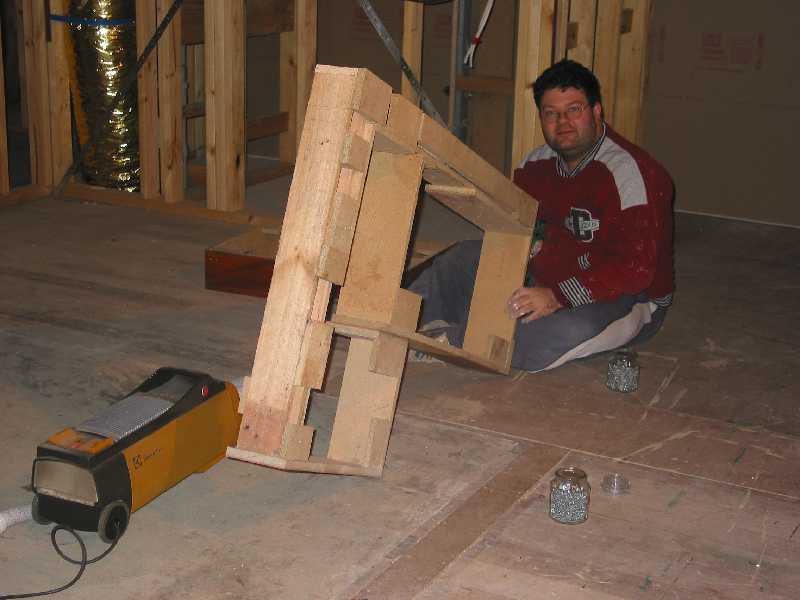 andrew constructs kickboard and laundry cupboard support