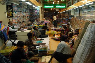 Large, disorganized sari shop