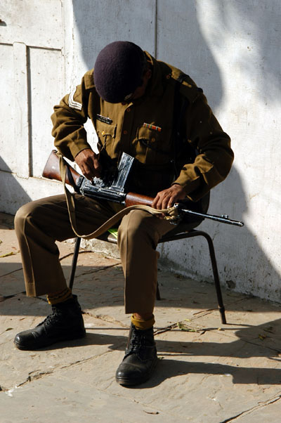 Soldier cleaning his weapon, Red Fort