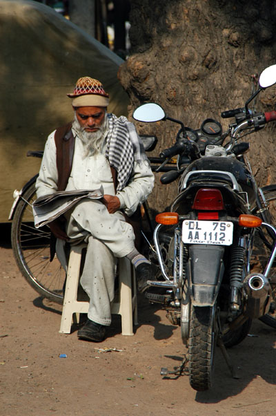 Man reading, Delhi
