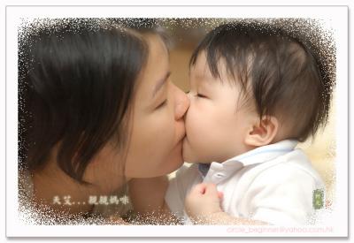 Kisses with her mum