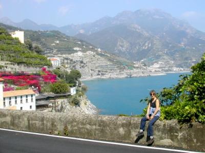 Judy on Amalfi Drive near the Hotel Marmorata, which is seen in the lower left side. On the coast of the Tyrrhenian Sea.