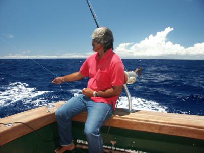 skipper jigging a lure