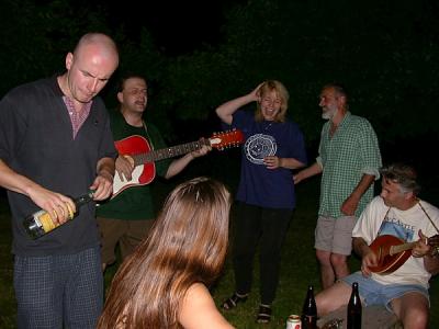 singing by fire in Zamek Garden