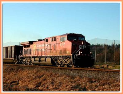 Head end of a unit coal train at sunset.