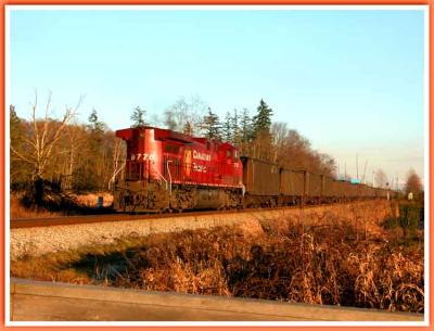Pusher engine at end of train.