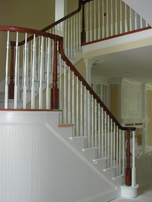 Stair railings stained to match cherry flooring