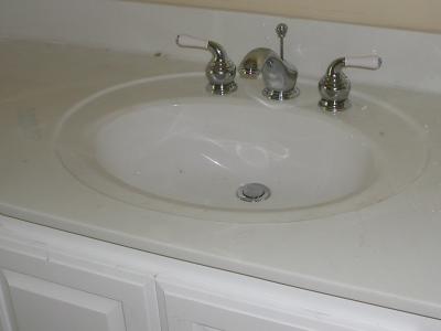 Fixtures installed on Heather's sink in the master bath