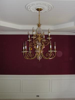 Quoizel chandelier hangs proudly in the dining room