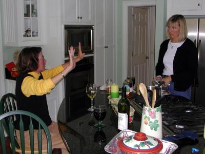 Maureen offers high-5 to Heather