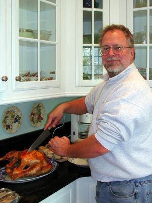 Mike carves the turkey
