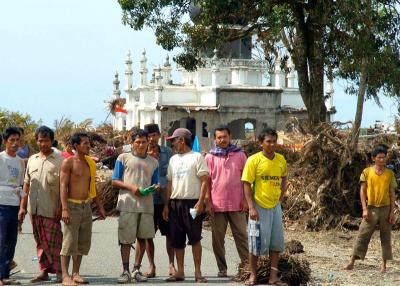 tsunami survivors in front of mosque