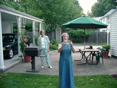 Chris Waltz taking pictures, Cathy Waltz in background