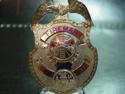 obsolete fireman's badge,new title is now firefighter