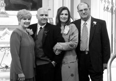 Brad with mom Jean, sister Lori, and father Frank