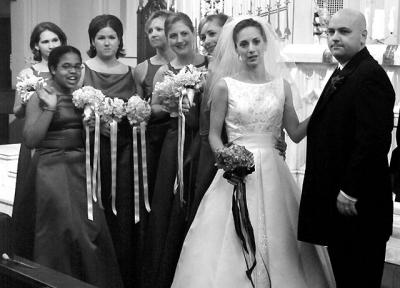 Brad and Jessica pose with the bridesmaids