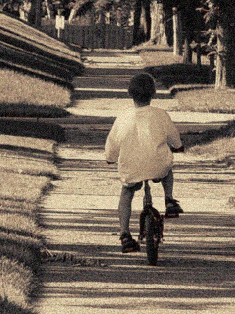 <p align=right><b>No Training Wheels!</b><br><i><font size=1> photographed by Jim Fuglestad</font >