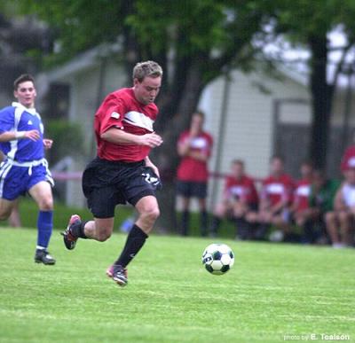 Jason Moore racing forward