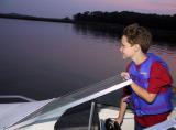 Mike drives the boat (my favorite pic).