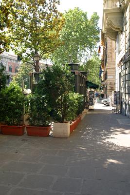 A sidewalk and gazebo along Via Veneto in Rome, Italy.