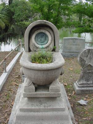 An interesting gravestone resembling a baby carriage