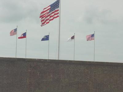 A great photo of the flags flying over the fort