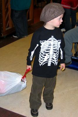 Aiden with a bag of costumes