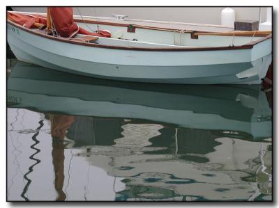 Green Boat Reflection