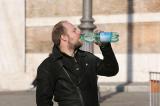 a real (biker) man drinks water