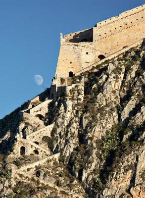 Nafplio - moon rising over Palamidi Fortress