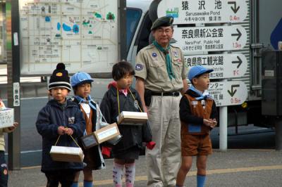 Japanese cub scouts and scoutmaster
