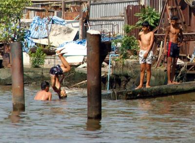 Boys swimming in the Khlong, Thonburi