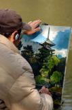 Hes painting the pagoda at Kofuku-ji