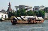 River tour boat passing Thammasat University