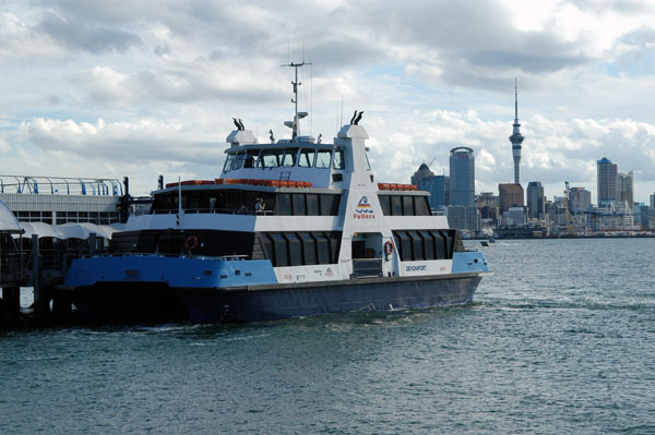 Ferry docked at Devonport with Auckland skyline