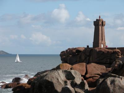 Lighthouse and sailboat